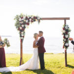 bride and groom's first kiss Chesapeake Bay wedding