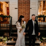 bride and groom enter reception at Philadelphia garden wedding
