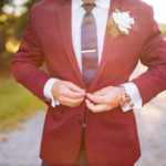 groom in burgundy suit jacket at eastern shore Maryland wedding